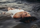 There is a unique and captivating beauty when a woman enters the water